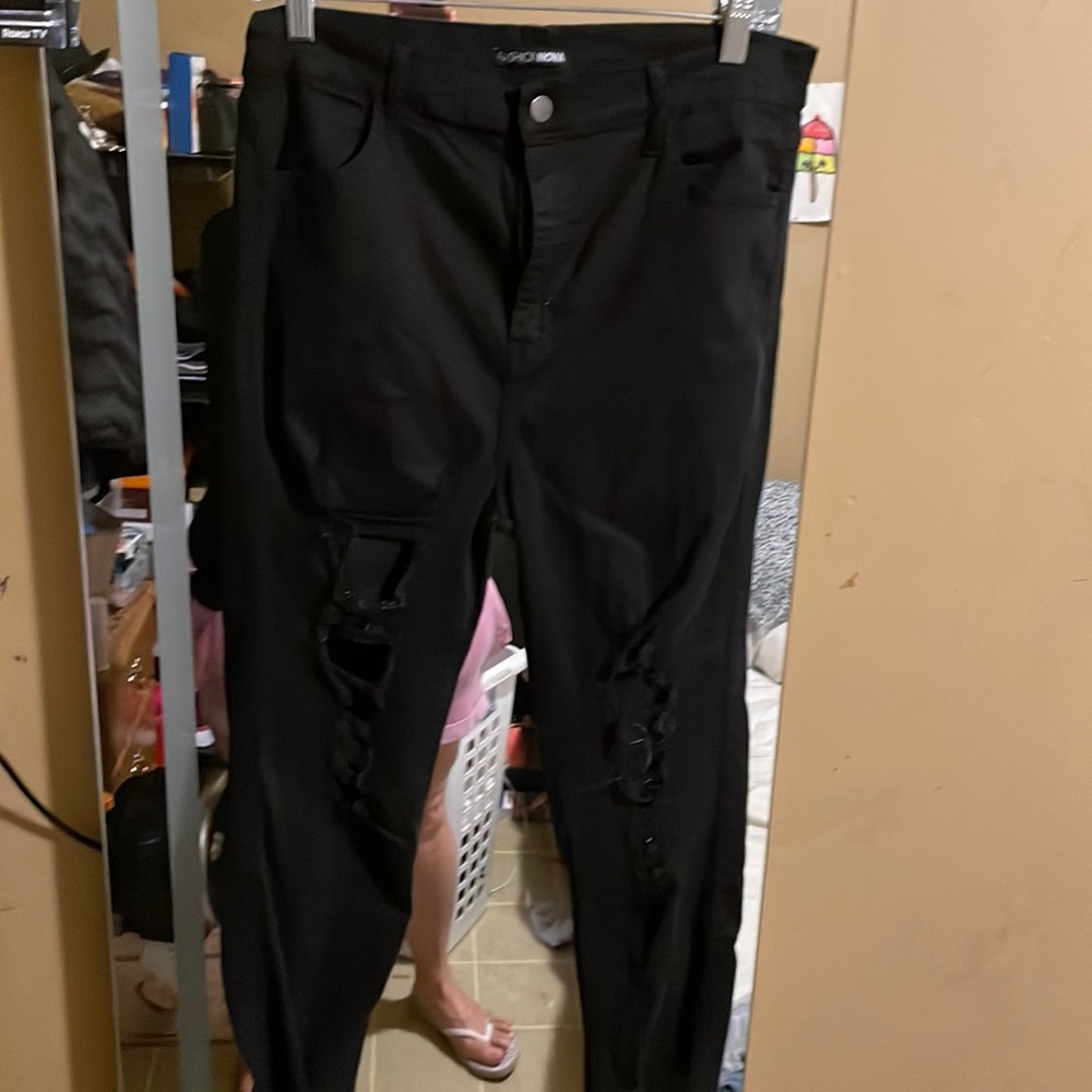 Fashion Nova black destructed skinny jeans